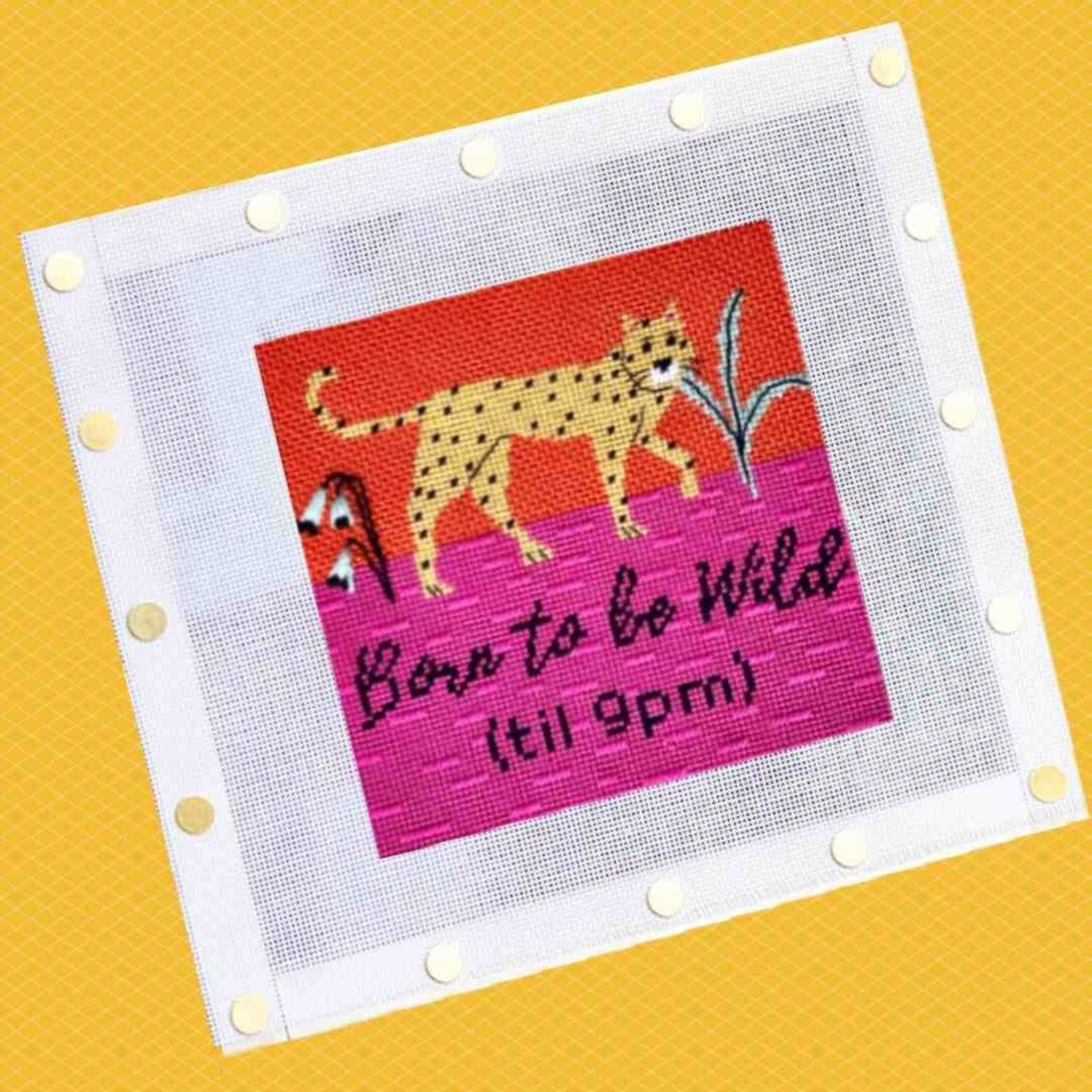 Embroidered patch with leopards and text on a yellow background