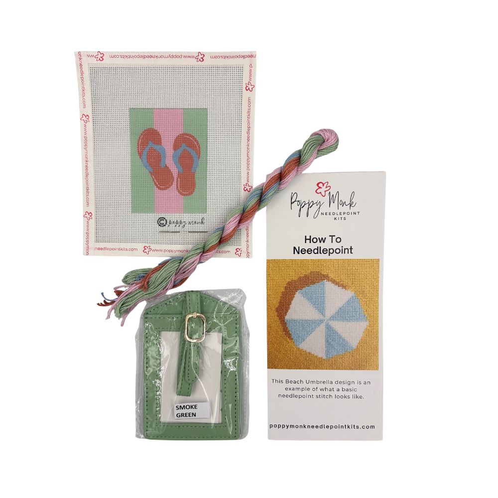 Luggage tag needlepoint kit showing contents