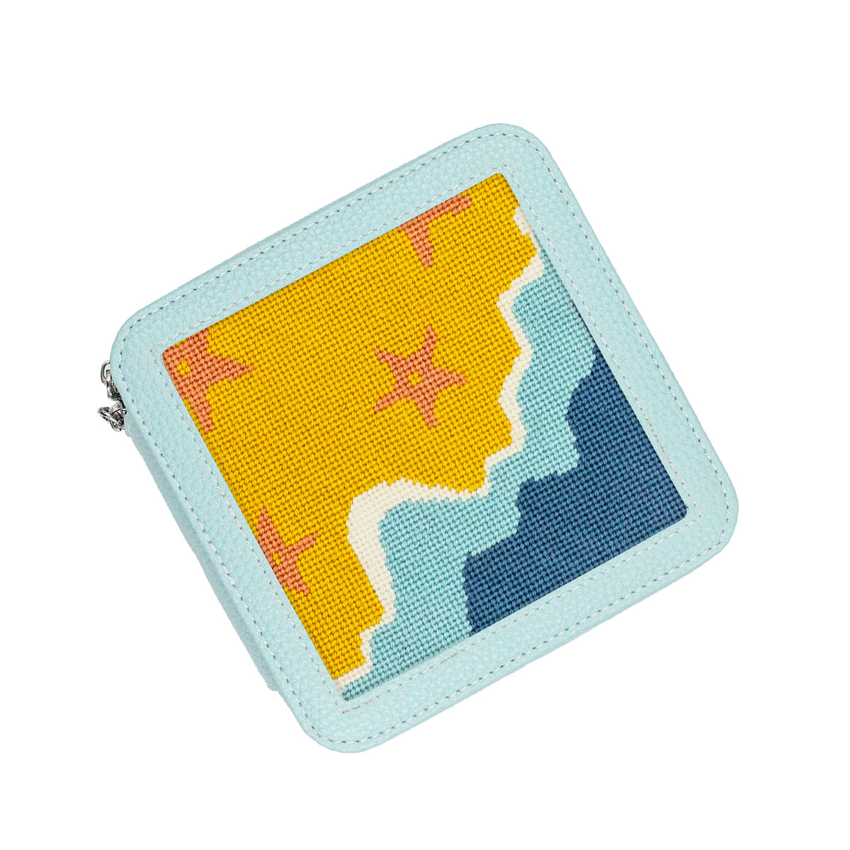 Starfish needlepoint in a blue box top