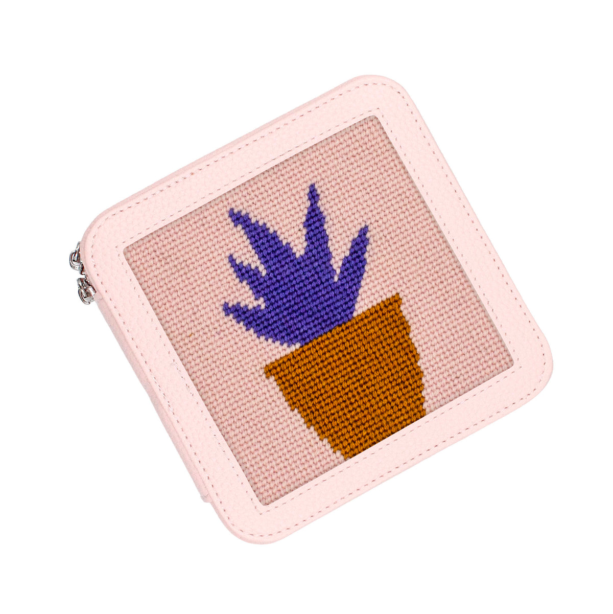 A light pink faux leather box featuring a needlepoint-style illustration of a purple succulent in a brown pot on a beige fabric background.