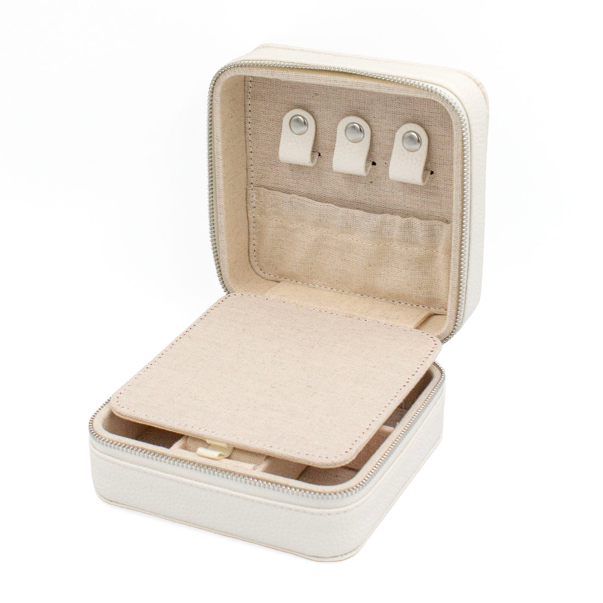 An open square jewelry organizer case in a light cream color, showing its beige fabric interior with a lined lid, three white snap hooks, and a padded insert tray.