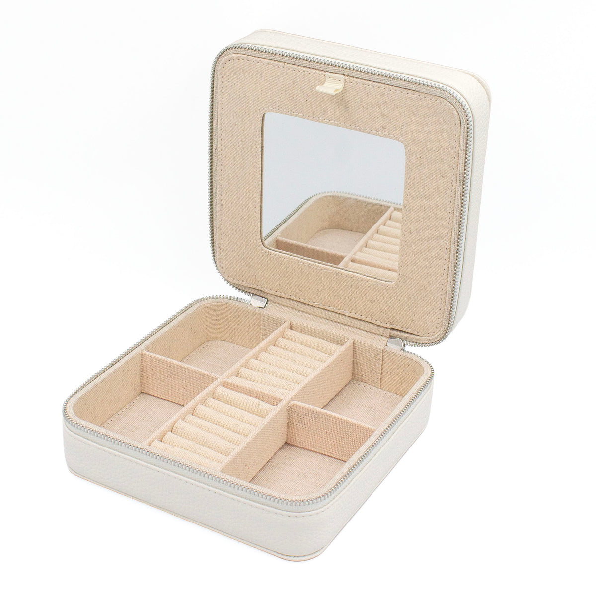 An open square jewelry box with a zipper closure, cream-colored exterior, and a beige fabric-lined interior featuring multiple compartments, ring rolls, and a mirror on the inside of the lid.