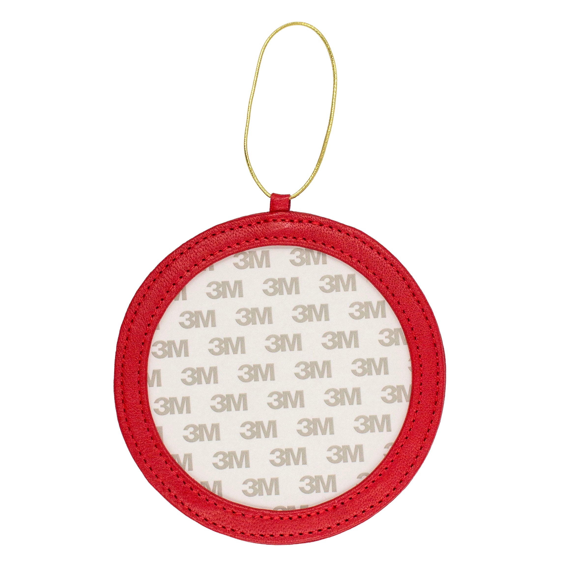 A round red leather frame-style ornament.
