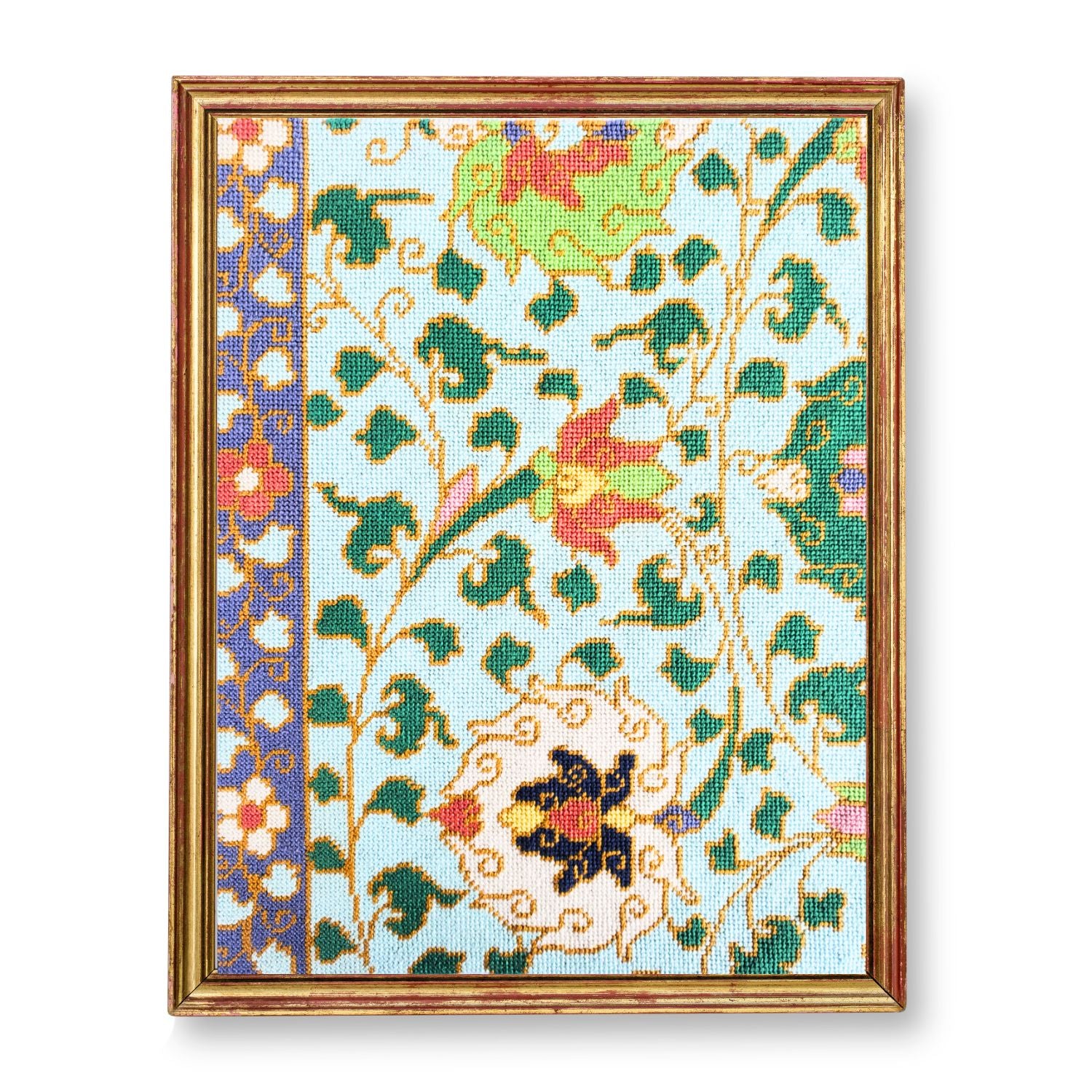 Chinese ornamental needlepoint design shown in a frame.