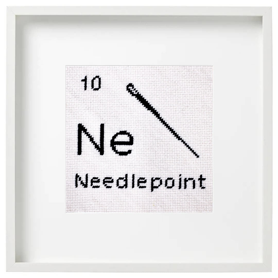 needlepoint design with a needle and &