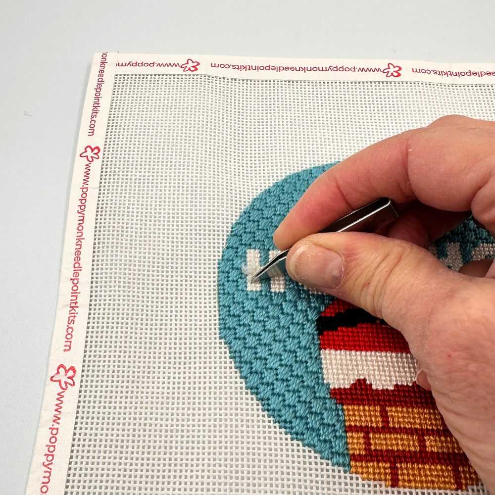 pulling out threads using tweeers