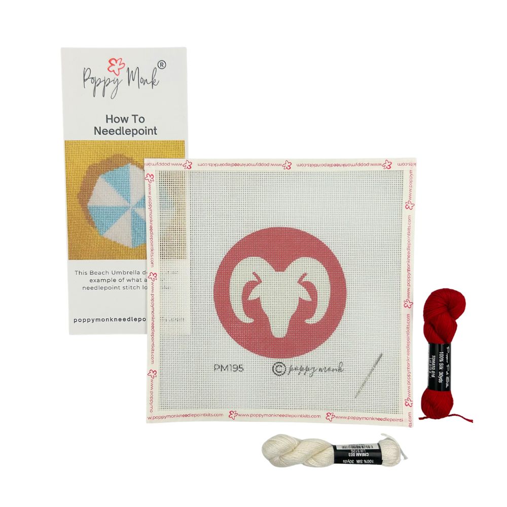 Aries needlepoint kit with canvas, yarn, and instructions on a white background