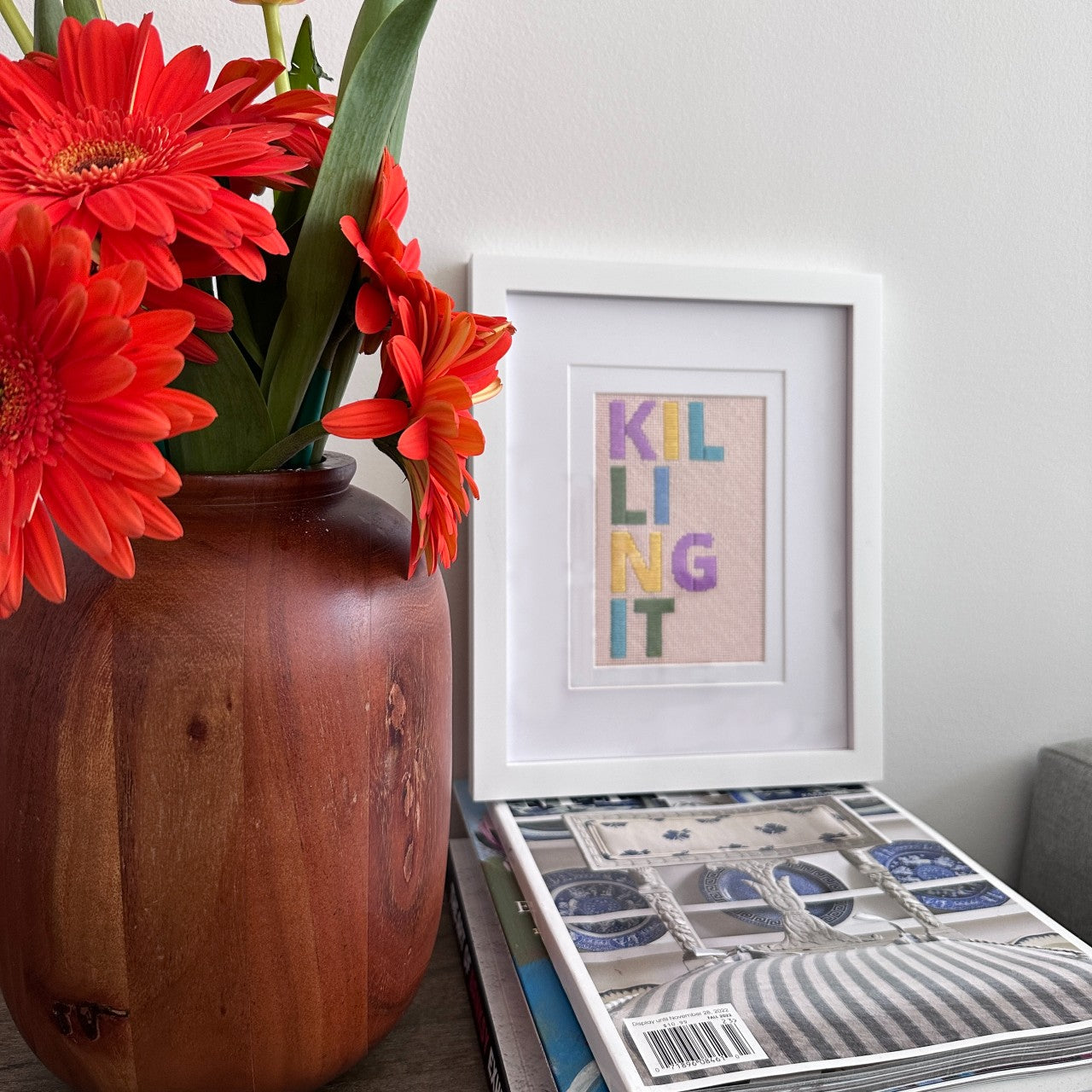 White rectangle frame with mat for 4" x 6" needlepoint canvas shown with stitched canvas.