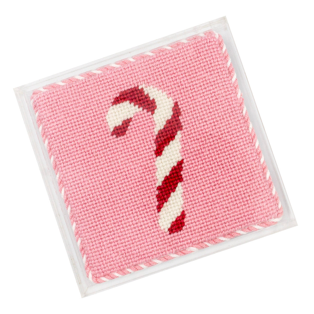An overhead shot of our beginner Candy Cane design finished inside a clear square acrylic coasters.