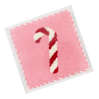 An overhead shot of our beginner Candy Cane design finished inside a clear square acrylic coasters.