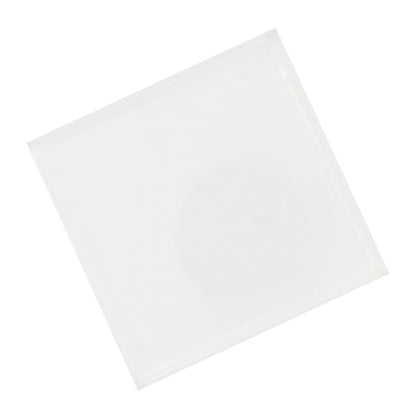An overhead shot of a clear square acrylic coasters.