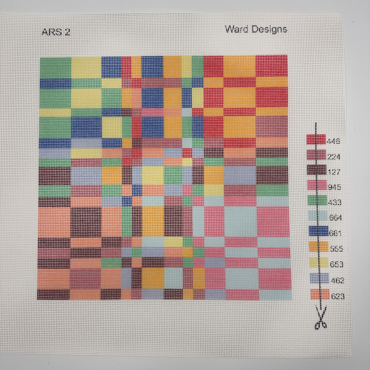 Color swatch with a grid of multicolored squares and a color chart on a gray background.