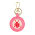 The Pink Beetle design stitched and in a pink circular fob with gold key rings.