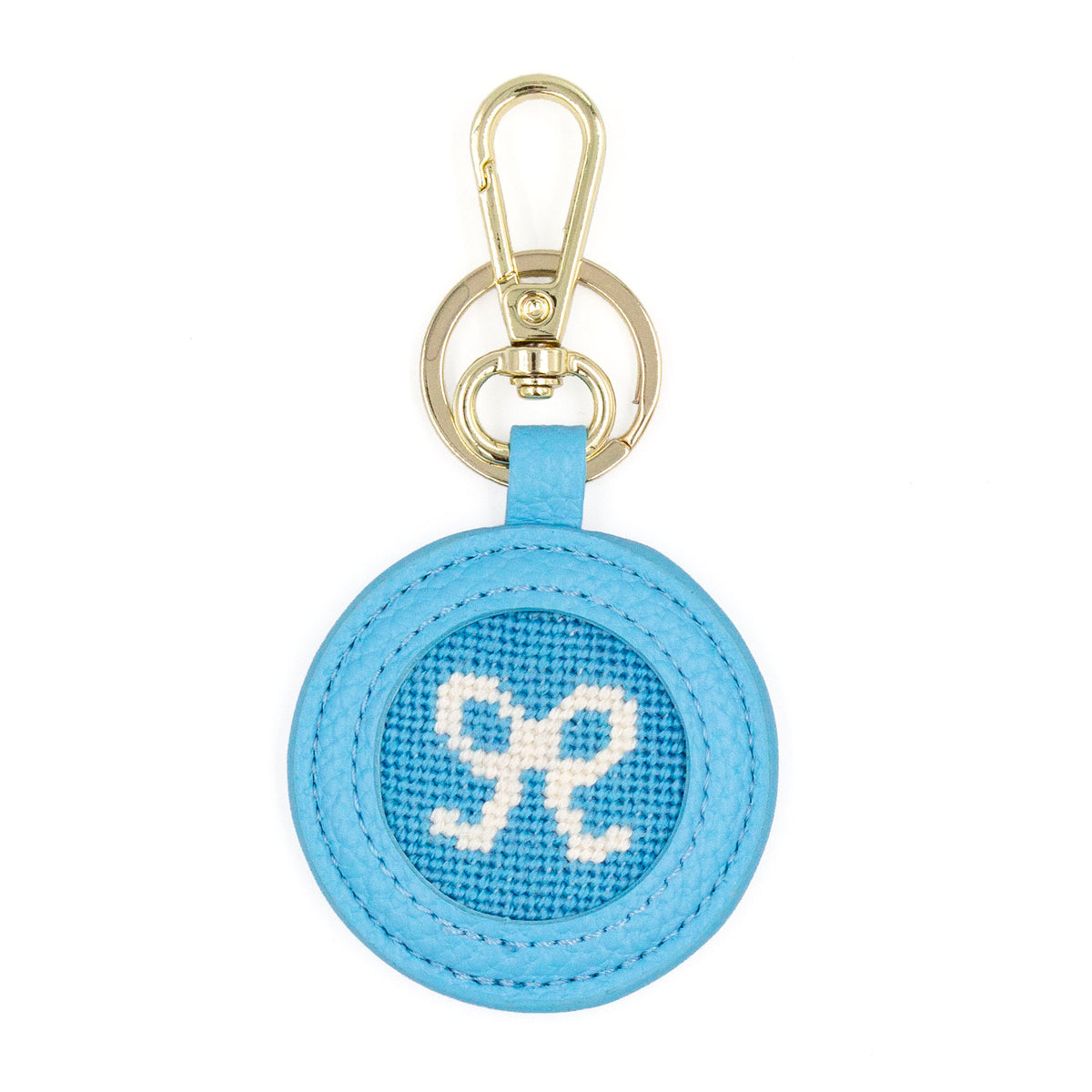 The Blue Bow design stitched and in a blue circular fob with gold key rings.