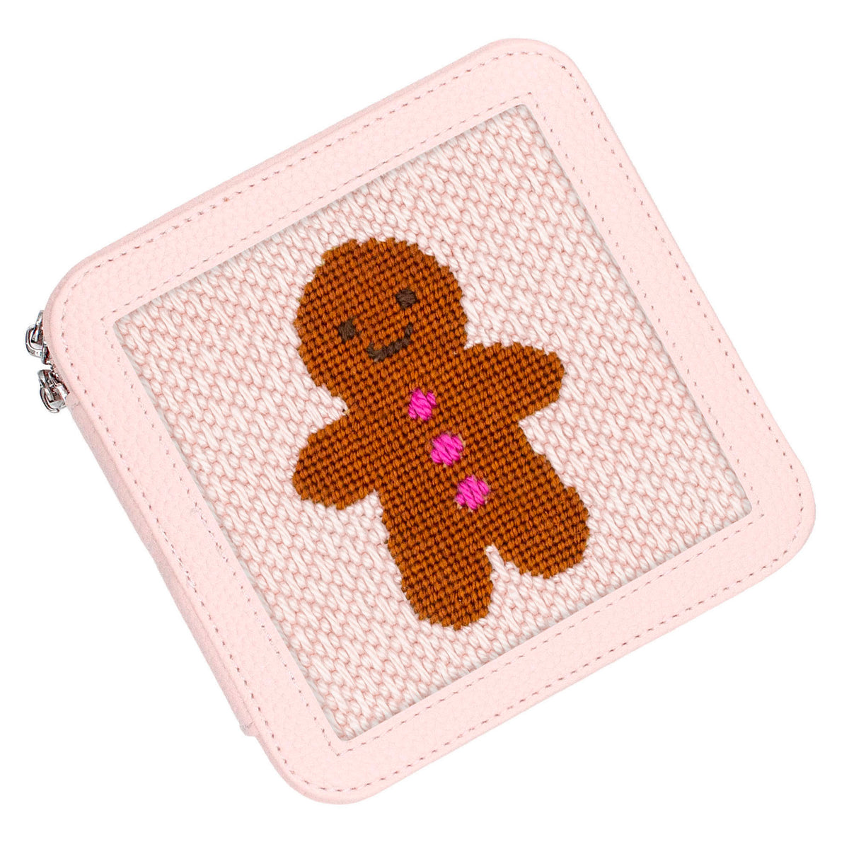 The light pink jewelry box with the Gingerbread Man design on top.