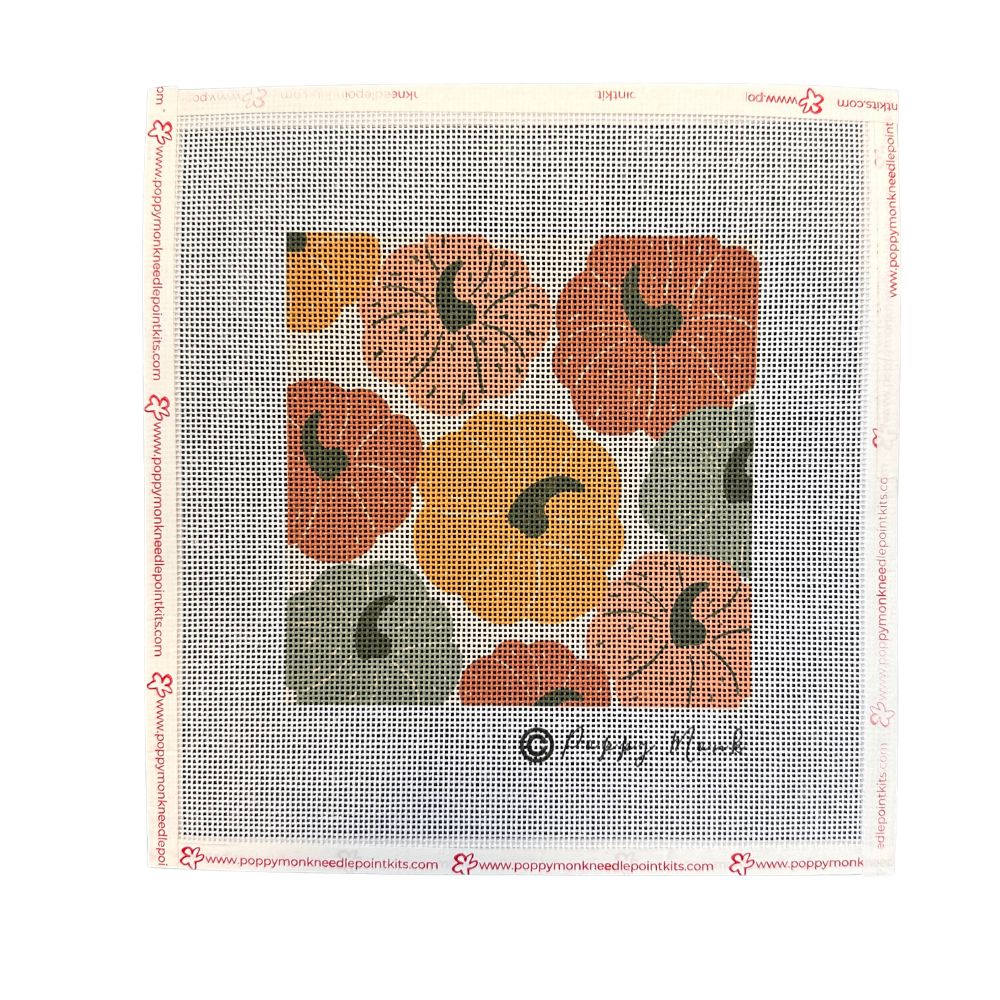 Needlepoint canvas with autumn-themed floral design.