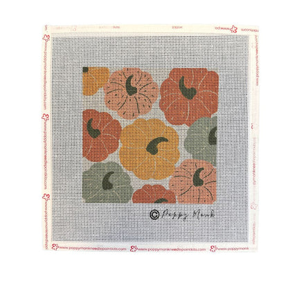 Needlepoint canvas with autumn-themed floral design.