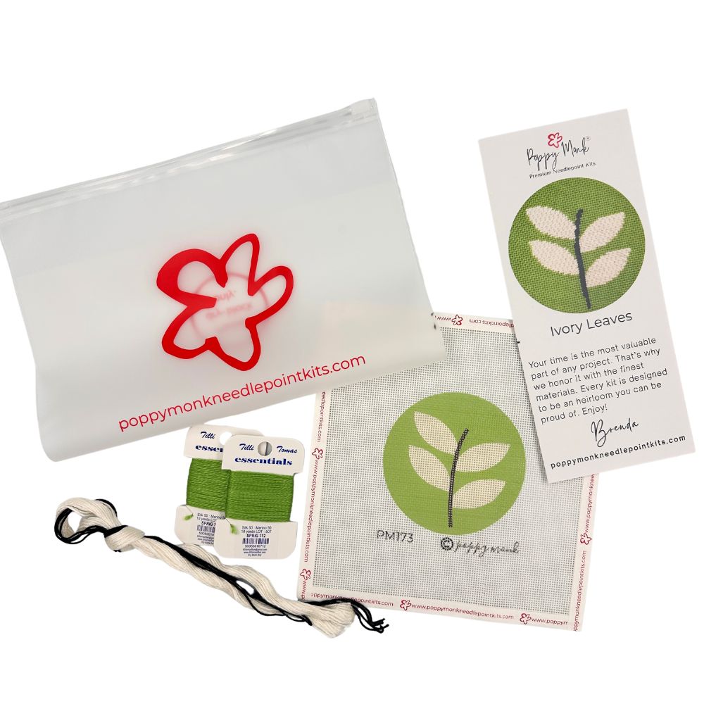 Needlepoint kit of a round design with branding on a white background