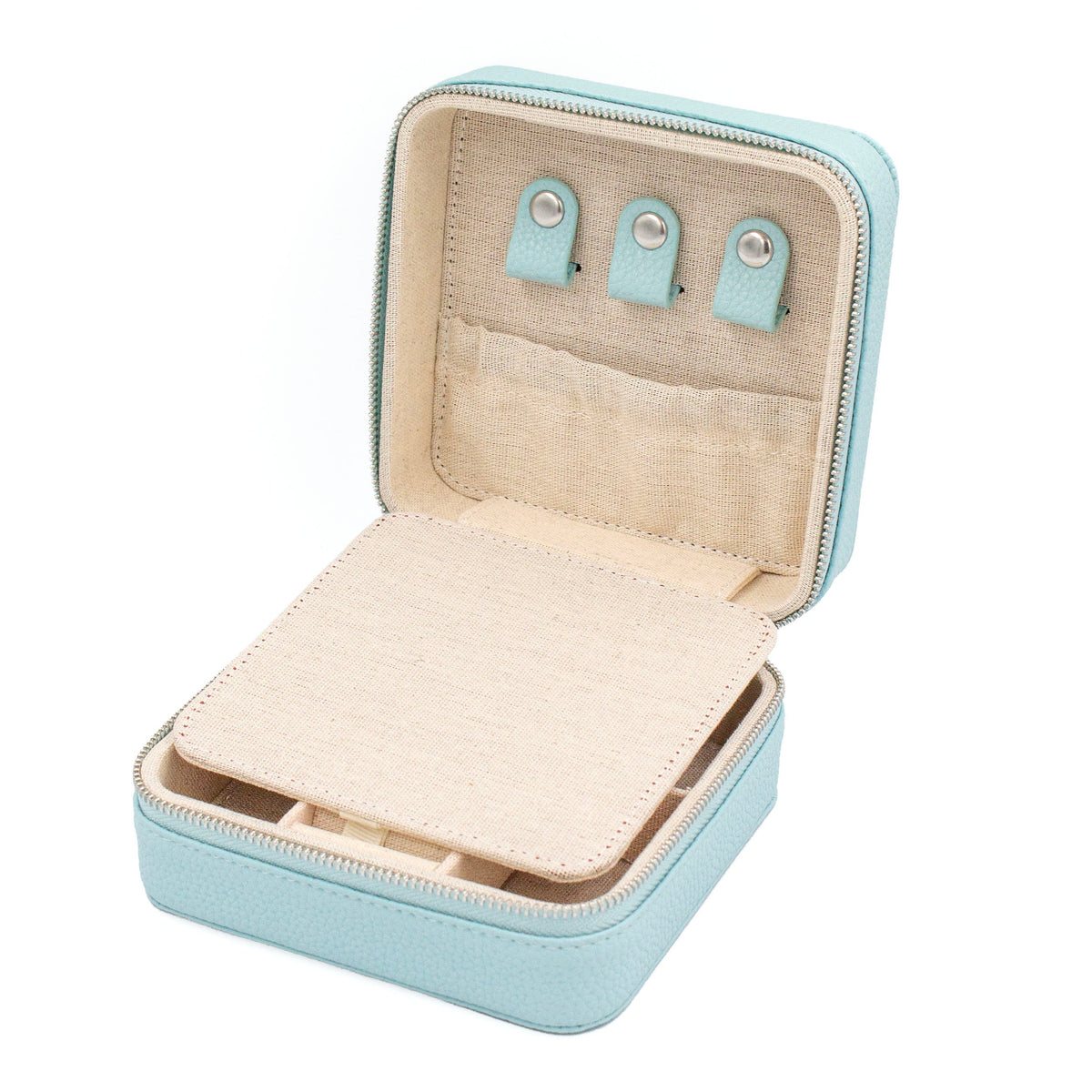 An open light blue jewelry organizer case with a beige fabric interior, showing three small turquoise ear clips and storage compartments.