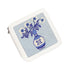 A white faux-leather zippered coin purse featuring a blue and white cross-stitch style illustration of a vase with flowers on the front.