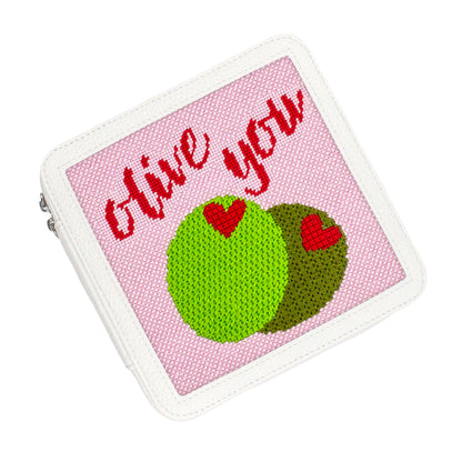 Olive You needlepoint in a white box top