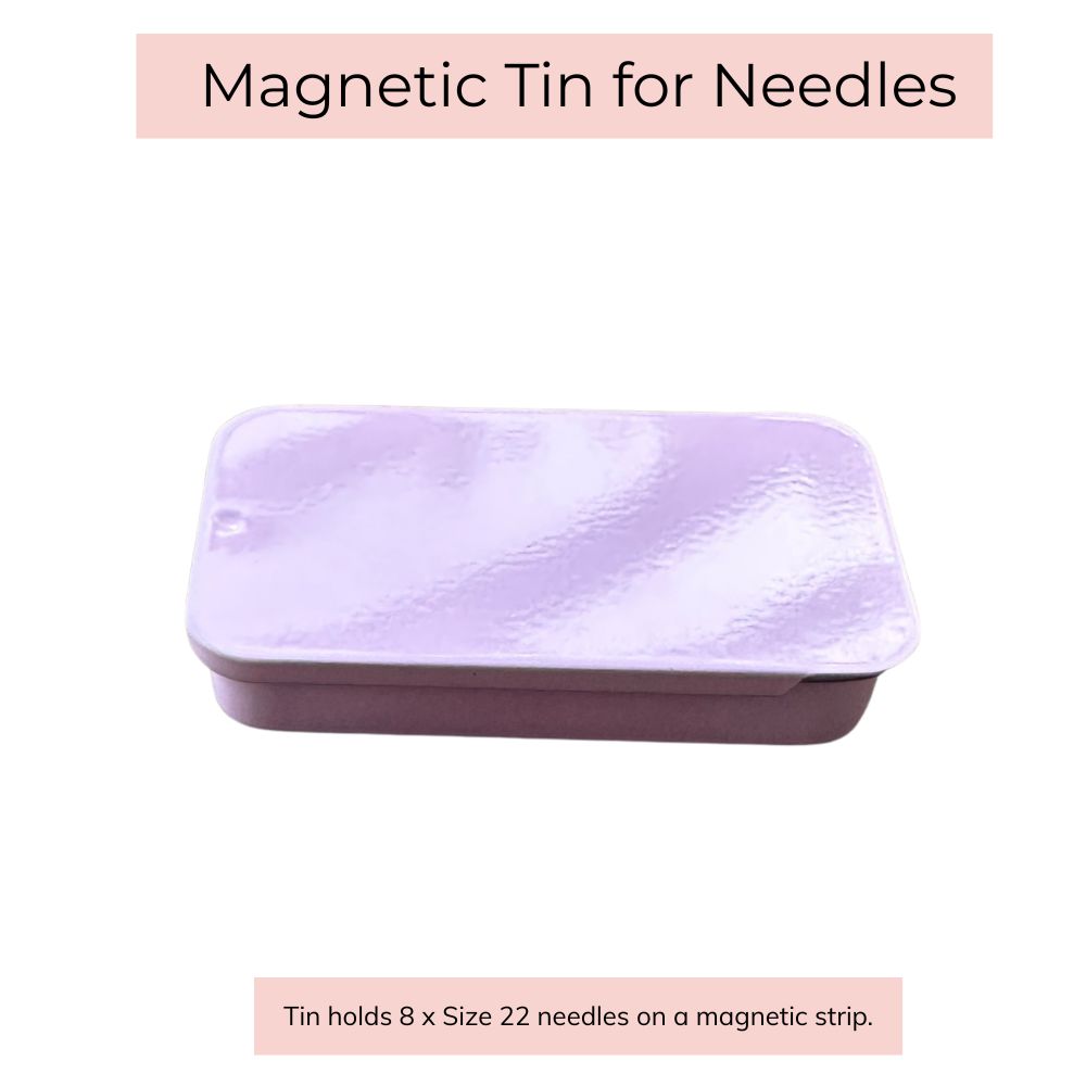Magnetic tin for needles with purple and white design on a white background