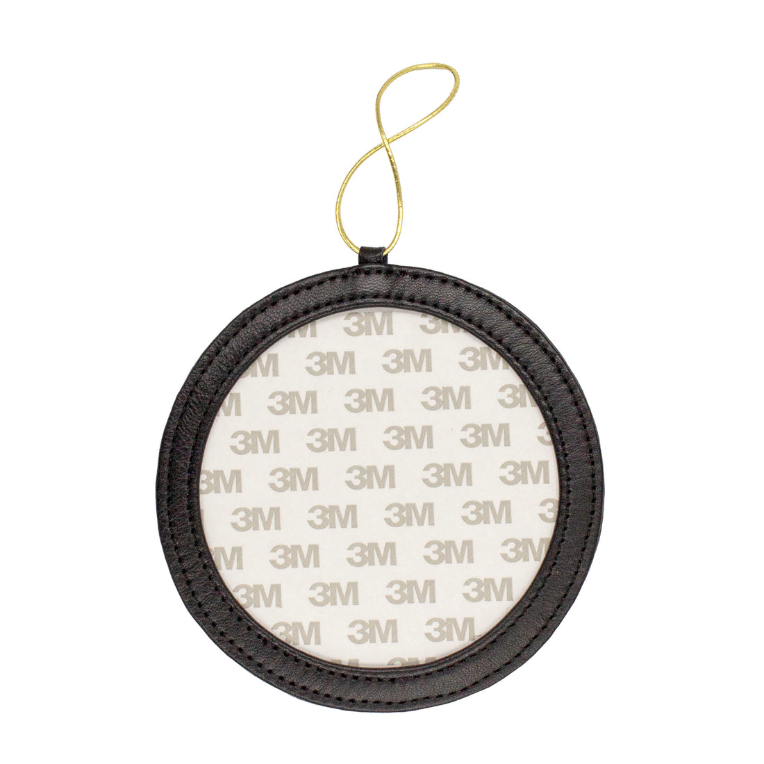 A round black leather frame-style ornament.