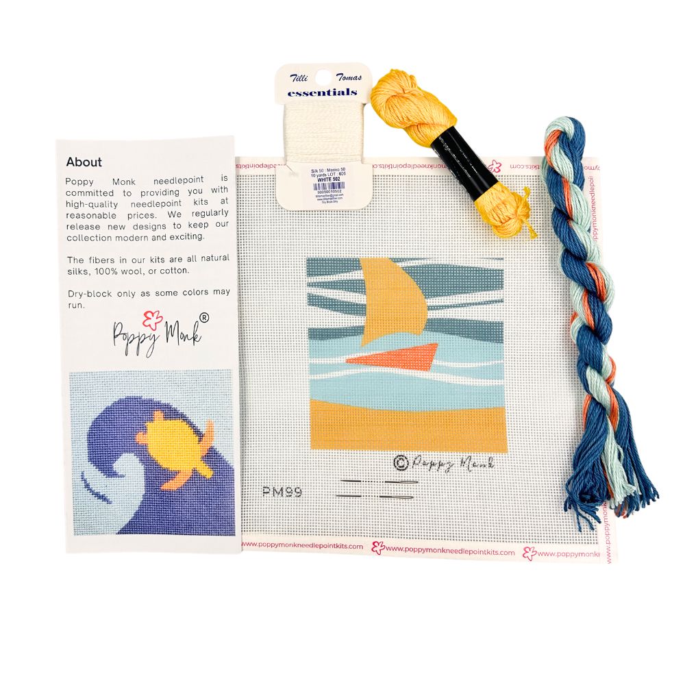 Needlepoint kit with a saiboat and threads