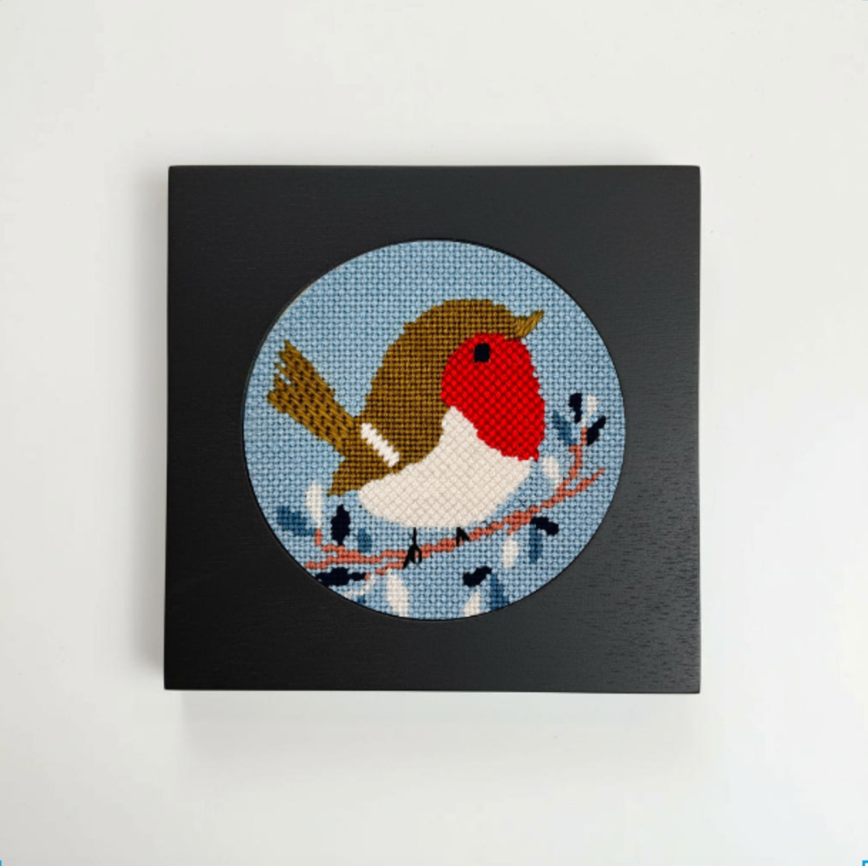 christmas robin needlepoint in a black frame