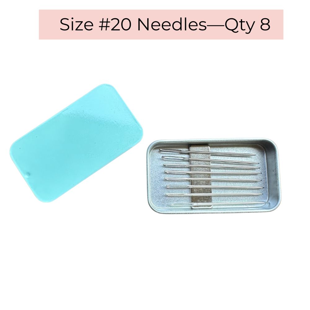 Needlepoint tapestry needles in a tin