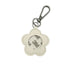 Flower-shaped keychain with a 3M logo on a white background