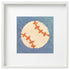 Baseball needlepoint design in a white frame