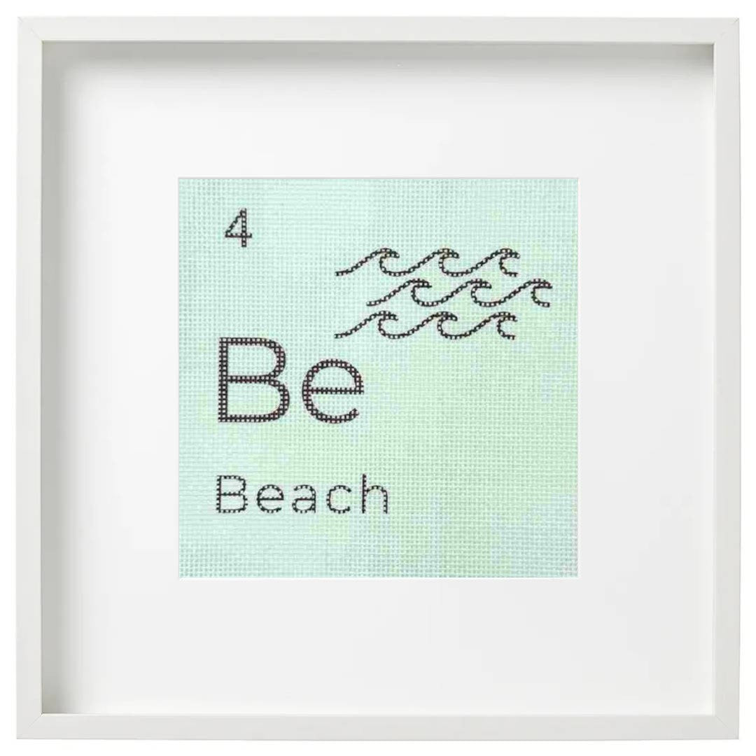 Framed needlepoint art with &