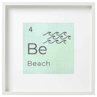 Framed needlepoint art with &