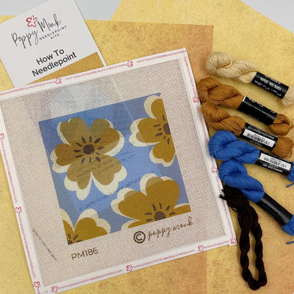 modern floral needlepoint design with threads