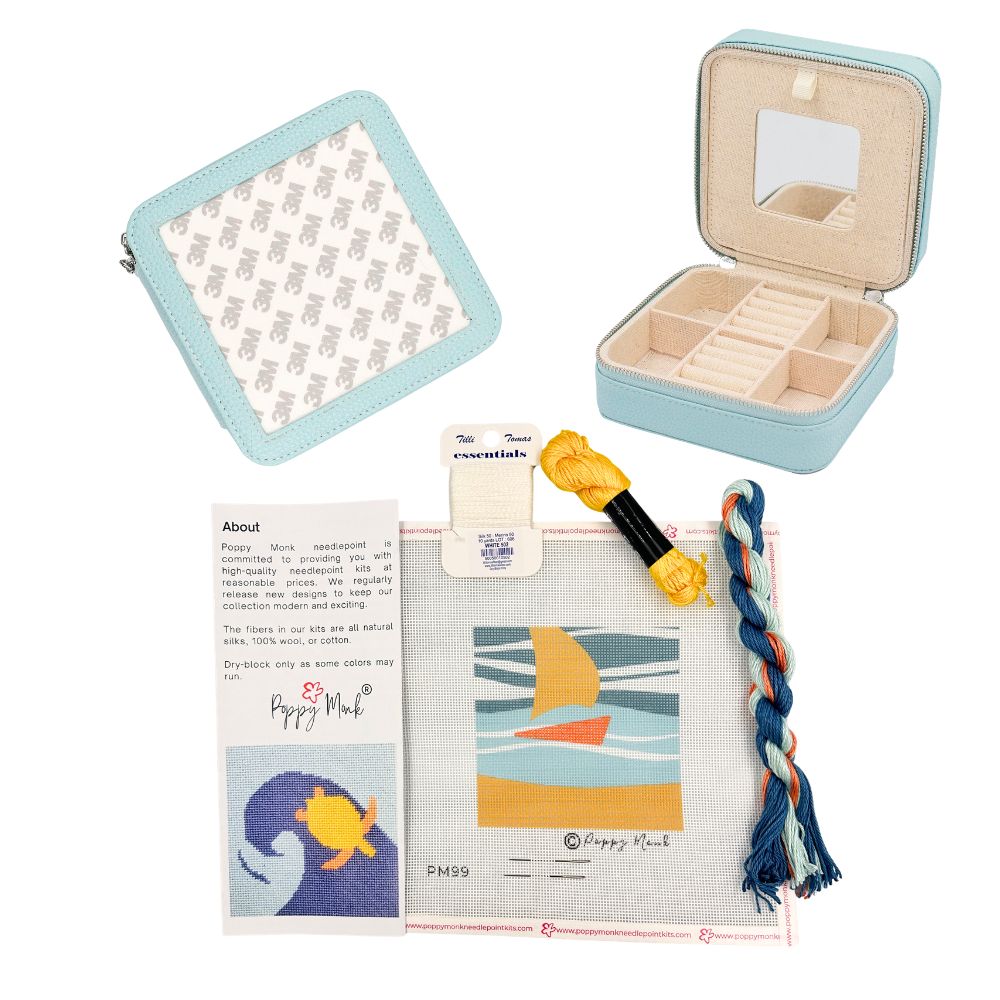 Sailboat needlepoint kit with a blue jewelry box
