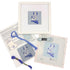 Needlepoint kit with a blue and white dog and a white frame