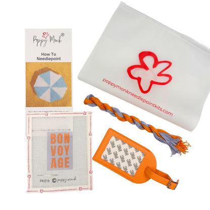 Poppy Monk needlepoint luggage tag kit with Bon Voyage canvas, threads, instructions and a bag