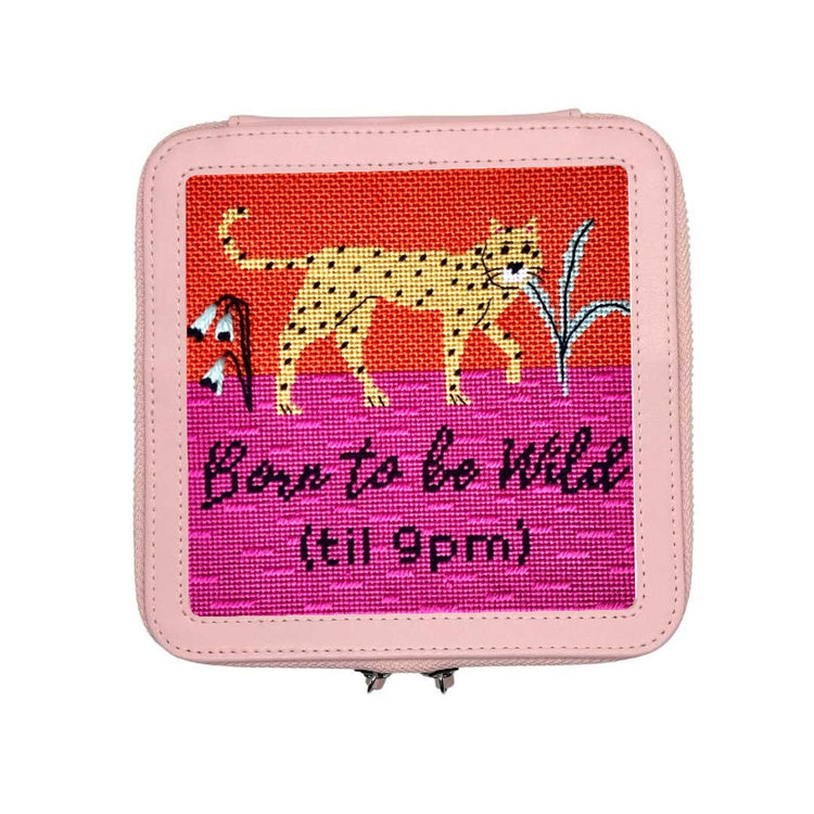 Born To Be Wild needlepoint in a pink leather box.