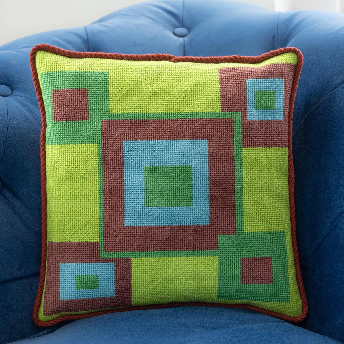 needlepoint pillow with blocks of color