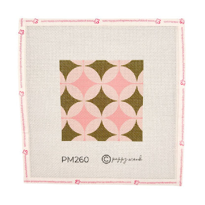 A green and pink geometric needlepoint canvas