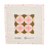 A green and pink geometric needlepoint canvas