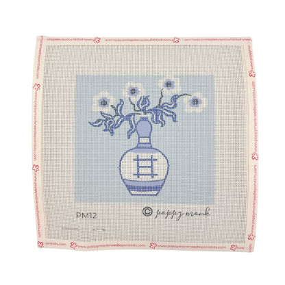 Needlepoint canvas design of a blue vase with flowers on a light blue background | 5" x 5"| 18 count canvas