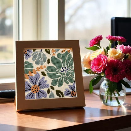 Fall for Flowers needlepoint in a frame