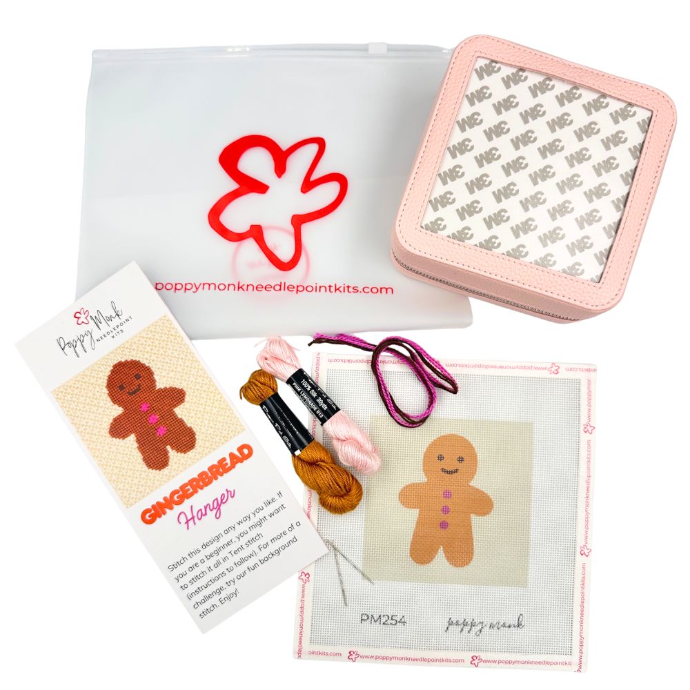Gingerbread man needlepoint kit with threads and a box