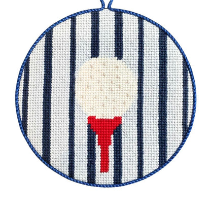 Golf ball on a tee with striped background needlepoint ornament