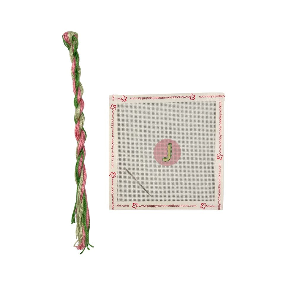 Pink and green thread with poppy monk J canvas