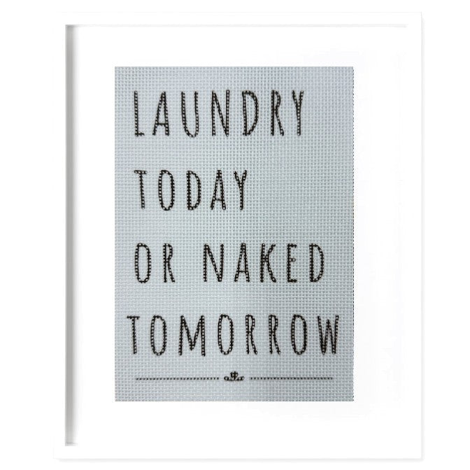 A funny needlepoint sign for the laundry.