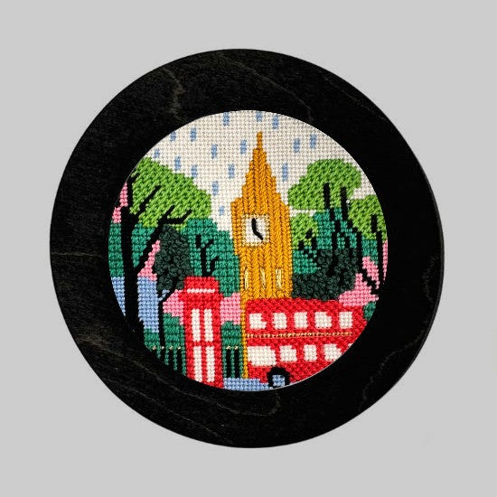 London needlepoint kit in a black wooden frame