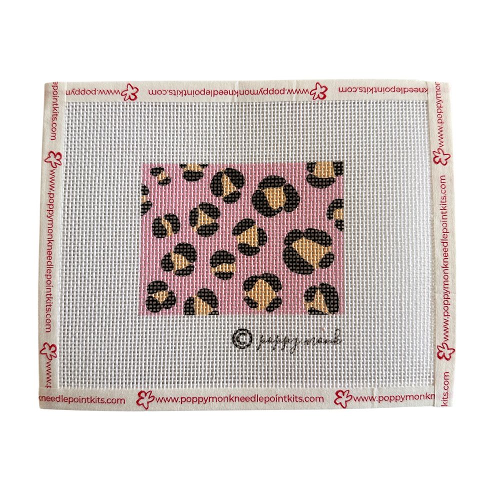 Leopard print needlepoint canvas on a white background with brand logo.